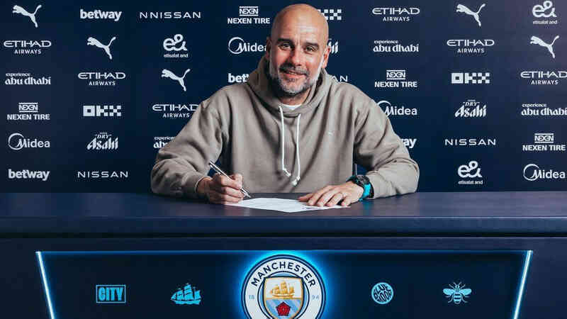 Pep Guardiola hồ hởi ký hợp đồng mới với Man City