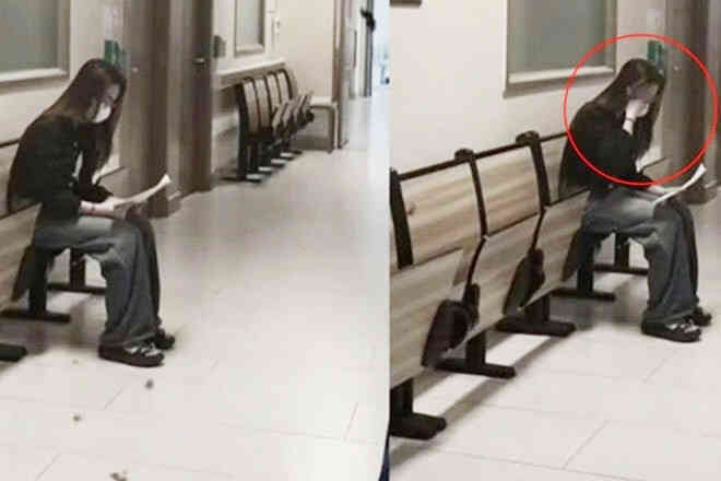 Cô gái bật khóc bên hành lang viện khi nhận kết quả, 