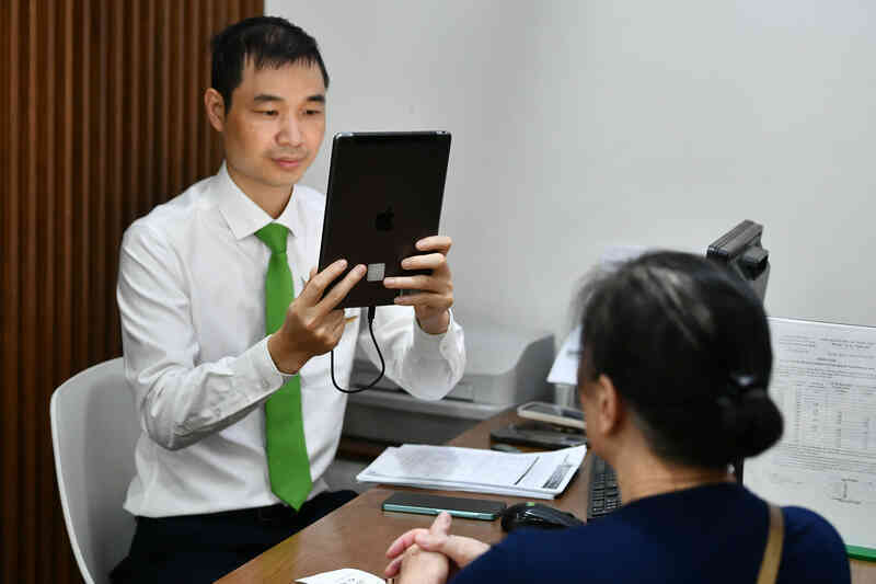 Từ 1/7, dừng mọi giao dịch tài khoản doanh nghiệp nếu chưa sinh trắc học