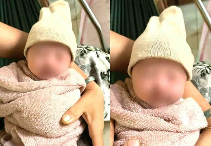 Phát hiện bé gái khoảng 1 ngày tuổi bị bỏ rơi trước kho hàng