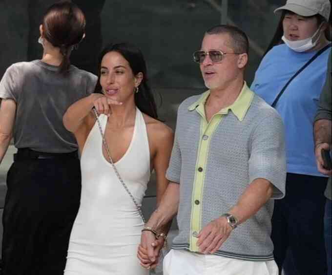 Brad Pitt dẫn bạn gái đi mua sắm